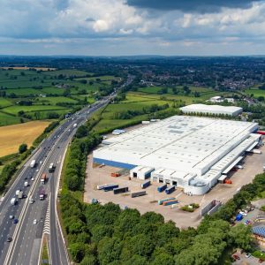 Large distribution centre next to M6 motorway, England, UK